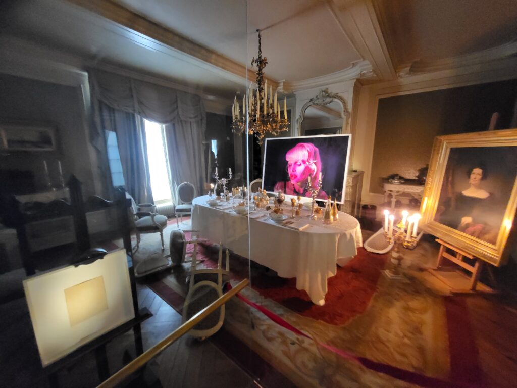 Dining room interior blending period furniture and modern photography