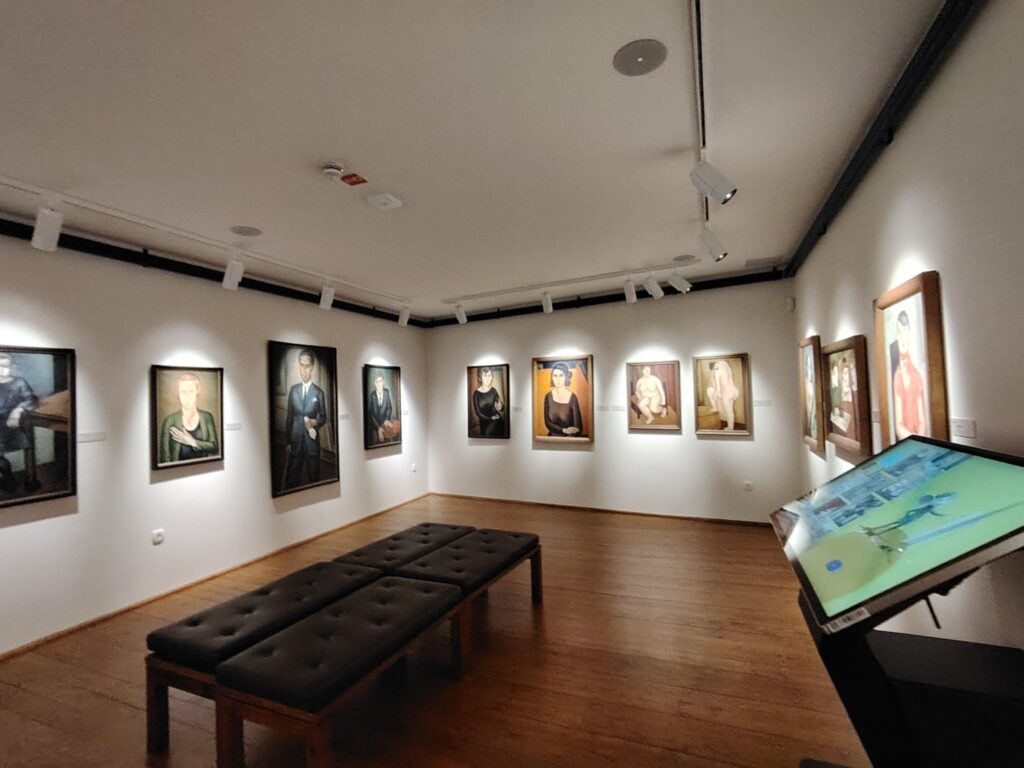 Gallery room in Pilon Gallery Ajdovščina with oil on canvas portraits by Veno Pilon