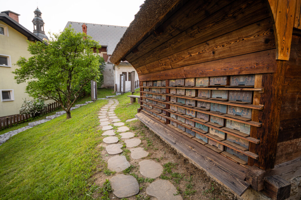 Traditional painted beehive panels on Janša’s Apiary in Breznica, Slovenia